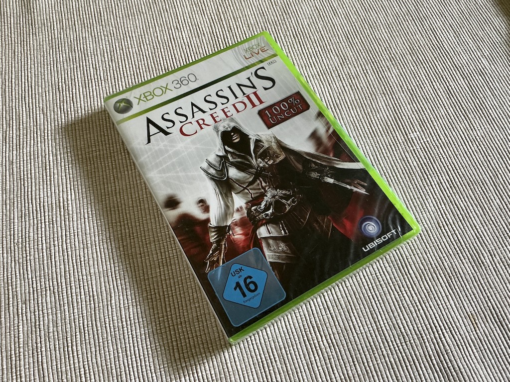 Bilder der physischen Xbox 360 Erst-Ausgabe von "Assassins Creed II"